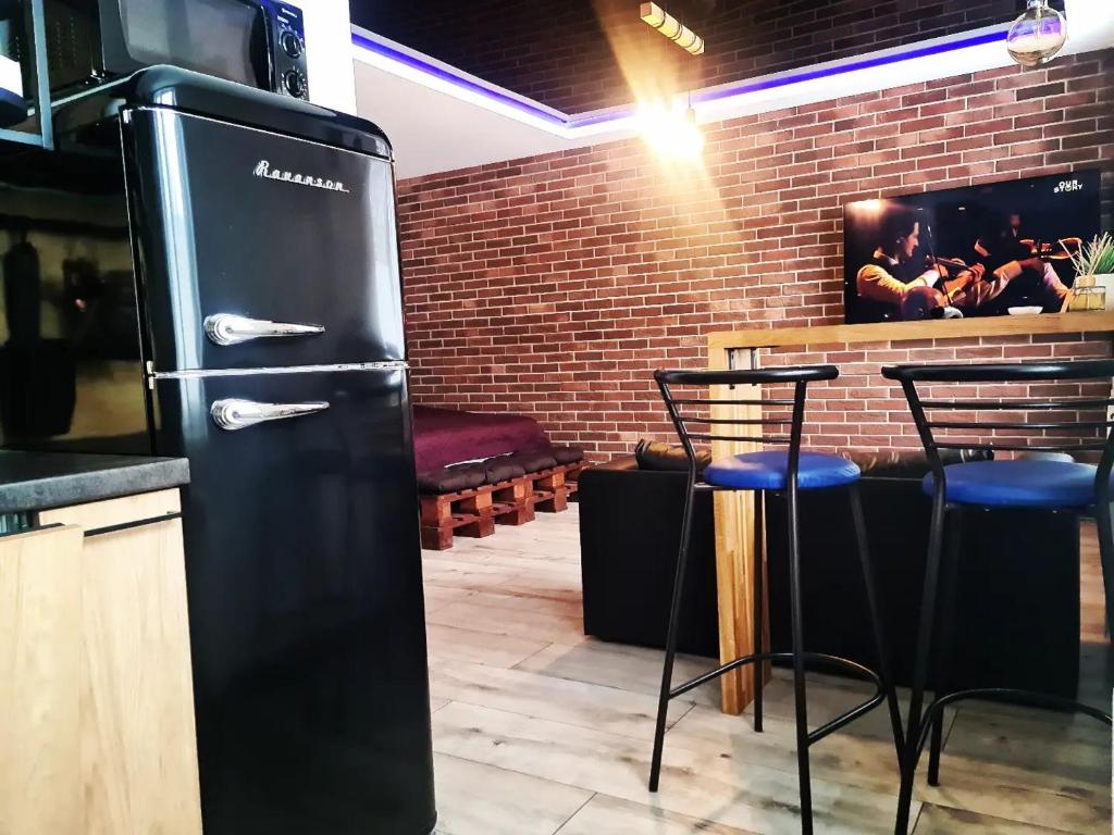 Kuchyň nebo kuchyňský kout v ubytování Narva City