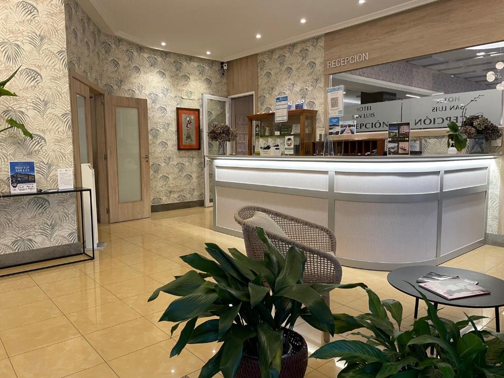 The lobby or reception area at San Luis