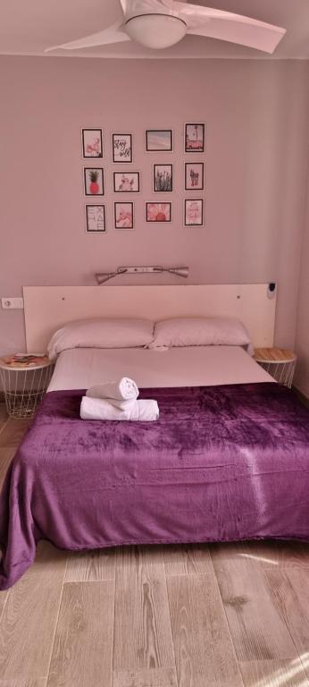 Postel nebo postele na pokoji v ubytování Hostal La Cabaña