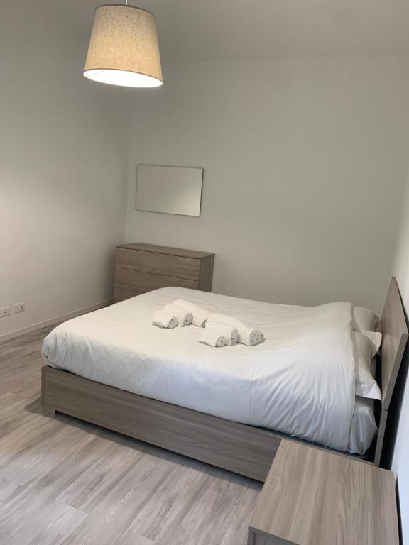Postel nebo postele na pokoji v ubytování CASA 8 GIUGNO