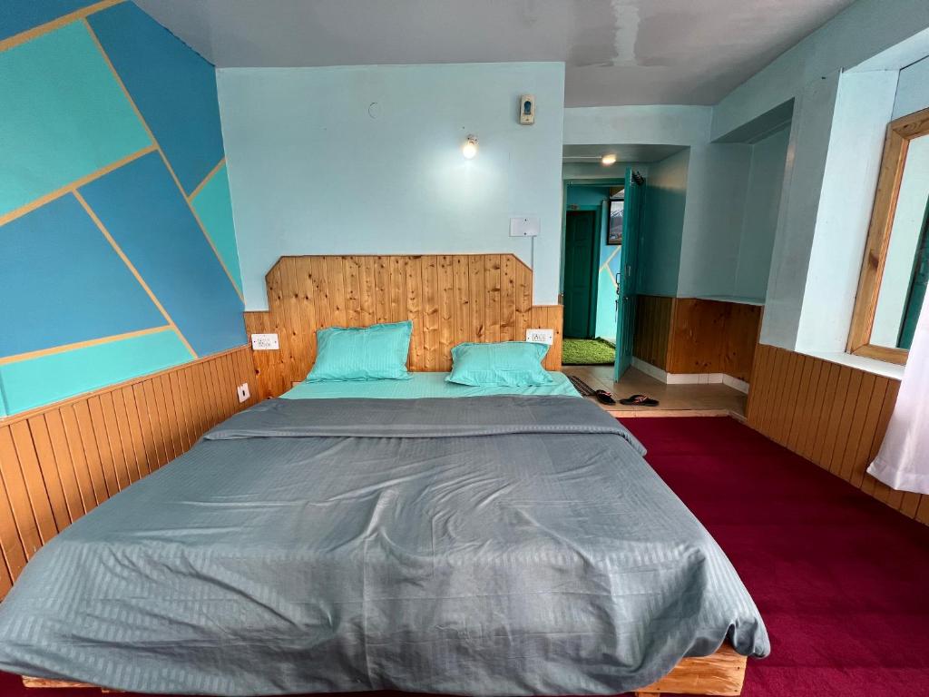 Postel nebo postele na pokoji v ubytování The Vagabond Manali