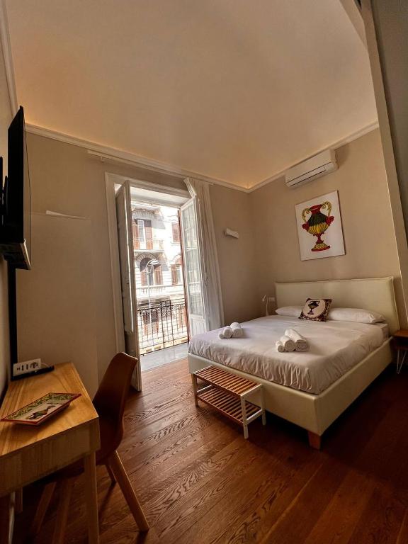 Posteľ alebo postele v izbe v ubytovaní B&B TIVÌTTI