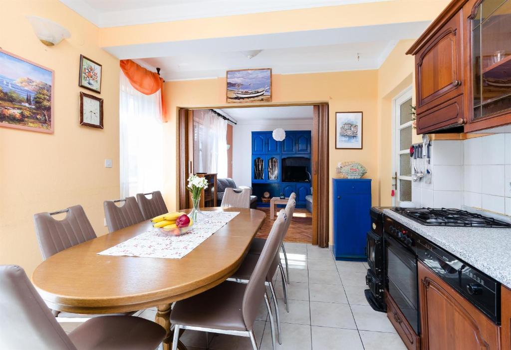 Kuchyň nebo kuchyňský kout v ubytování Apartments VESNA