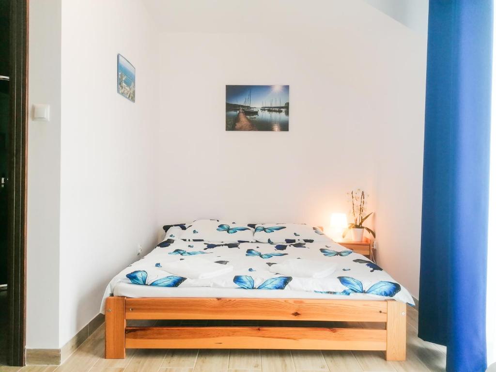 Postel nebo postele na pokoji v ubytování Willa Artus