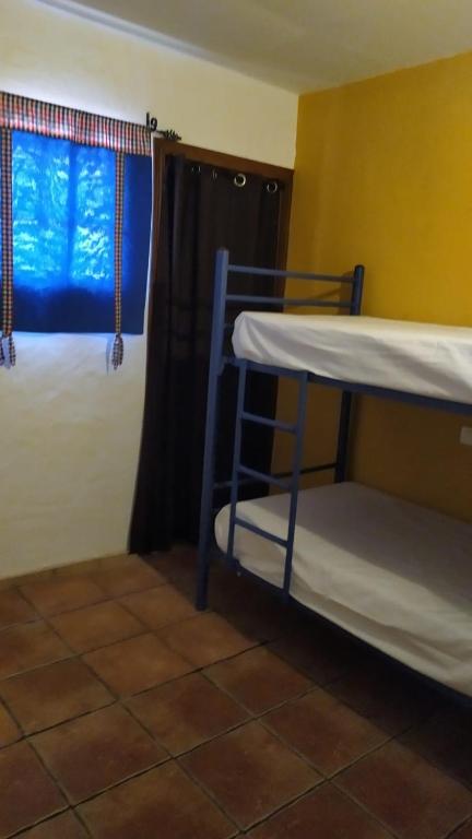 Posteľ alebo postele v izbe v ubytovaní Hacienda las zabalas