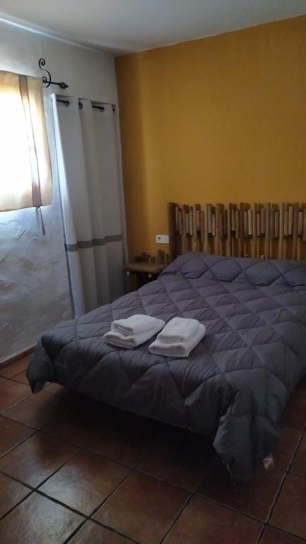 Posteľ alebo postele v izbe v ubytovaní Hacienda las zabalas