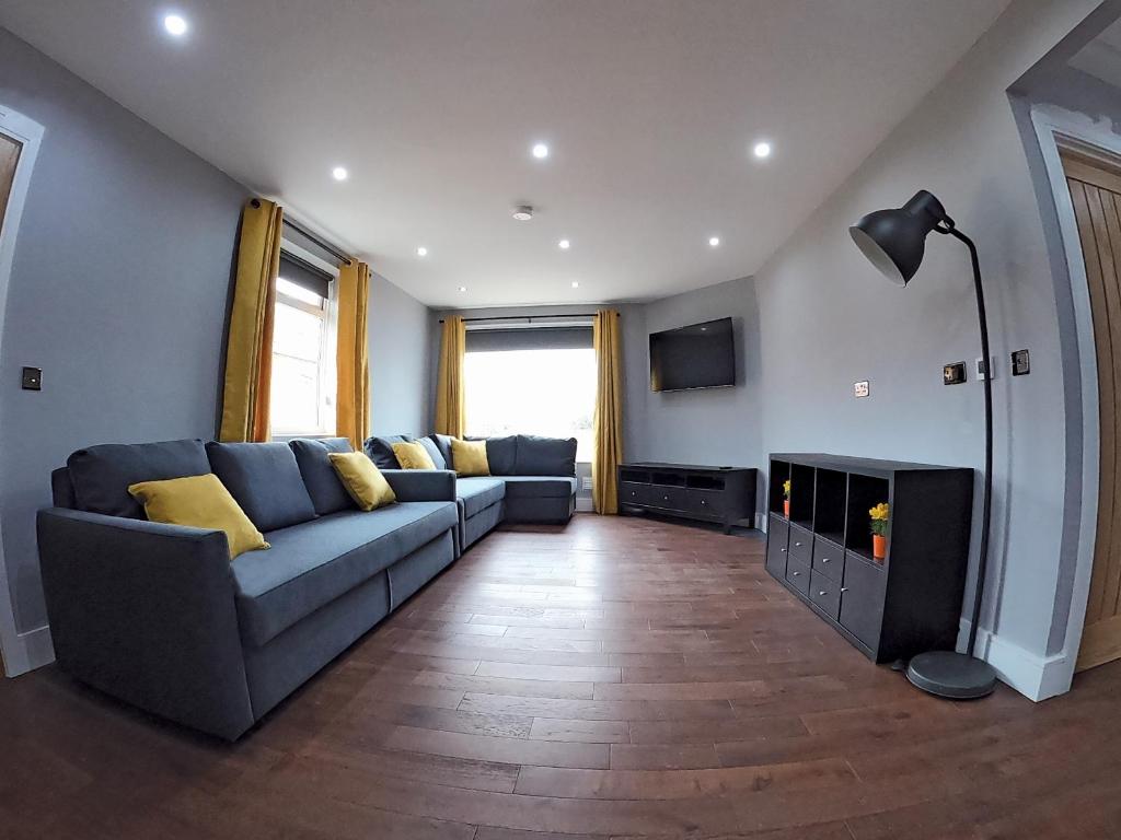 Ruang duduk di Fully Accessible - Disability Adapted Holiday Cottage - Skegness