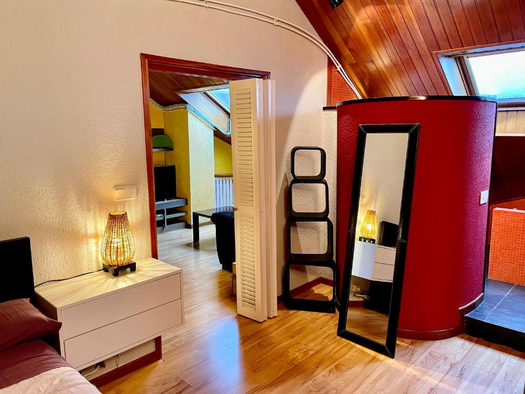 A bed or beds in a room at Buhardilla original