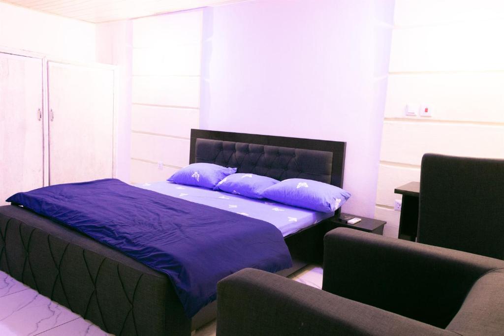 Postel nebo postele na pokoji v ubytování Easyinn Shortlet Apartment