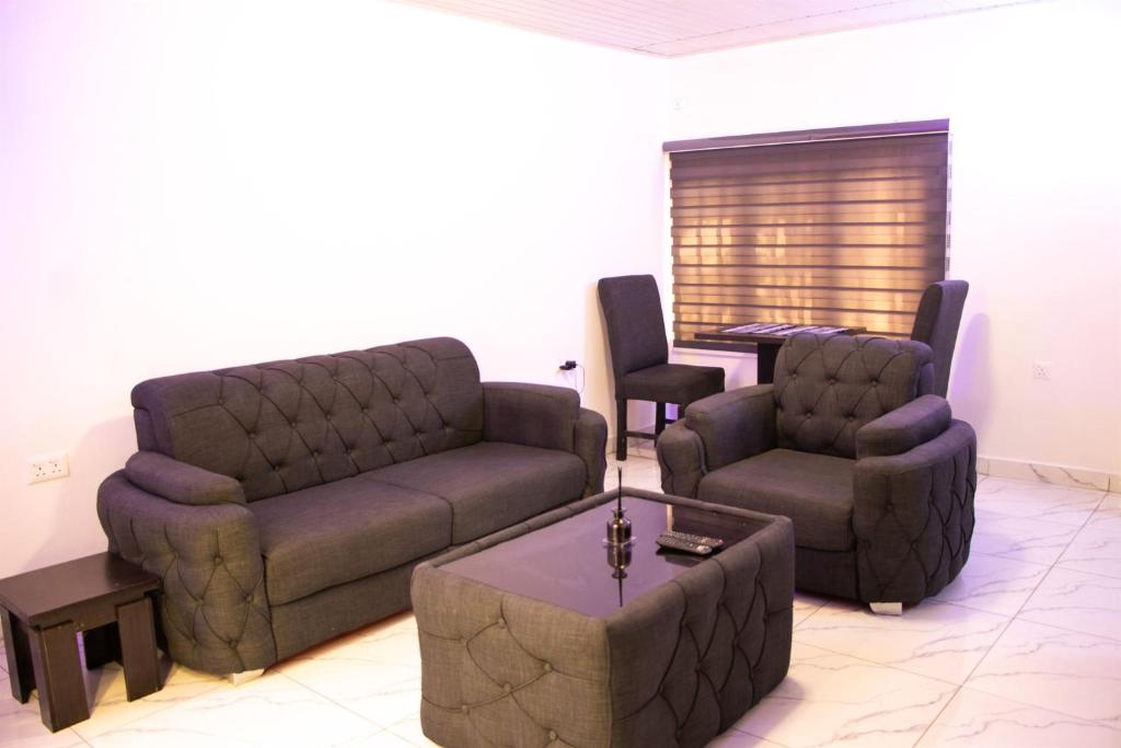 Posezení v ubytování Easyinn Shortlet Apartment