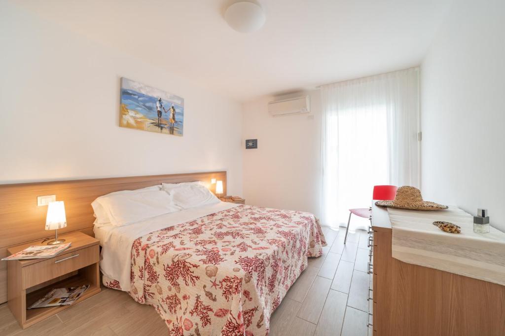 Postel nebo postele na pokoji v ubytování Residenza Monica