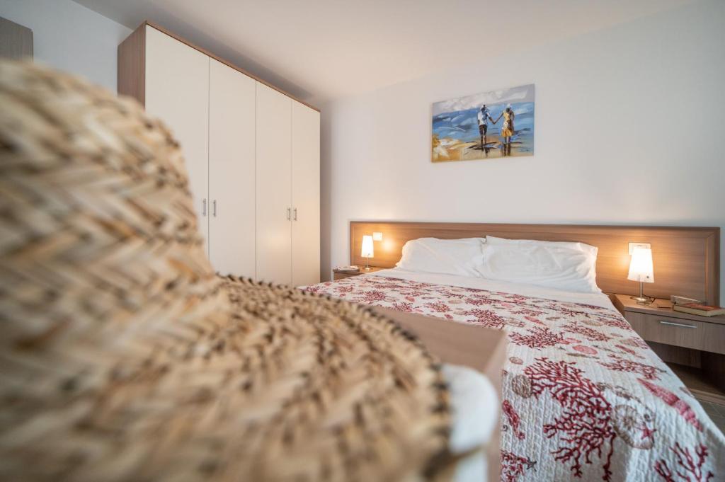 Postel nebo postele na pokoji v ubytování Residenza Monica