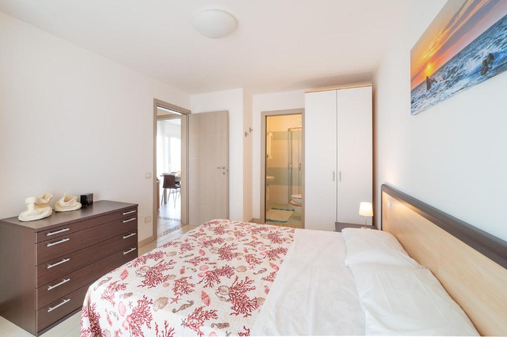 Postel nebo postele na pokoji v ubytování Residenza Monica