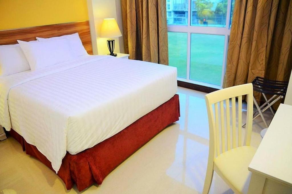 Кровать или кровати в номере The Grand View