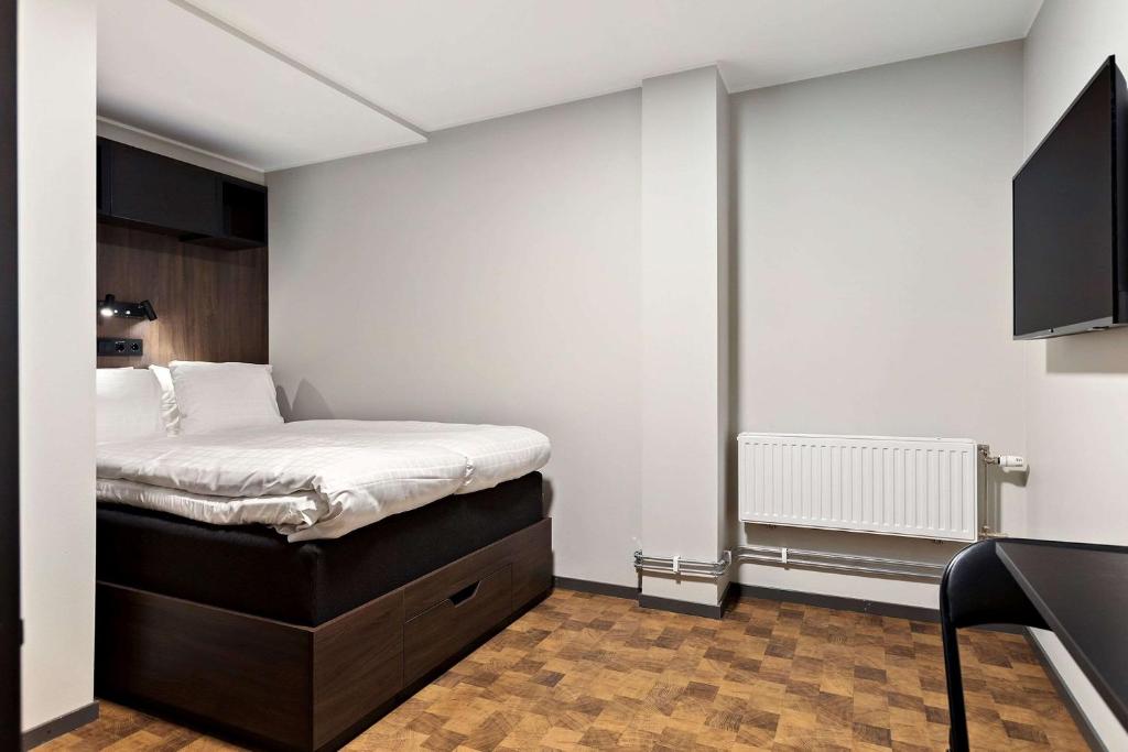 Postel nebo postele na pokoji v ubytování Sure Hotel Studio by Best Western Bromma