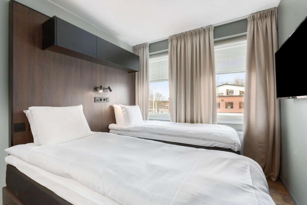 Postel nebo postele na pokoji v ubytování Sure Hotel Studio by Best Western Bromma