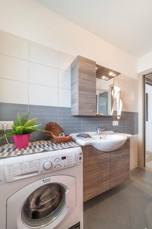 Kuchyň nebo kuchyňský kout v ubytování Residenza Monica