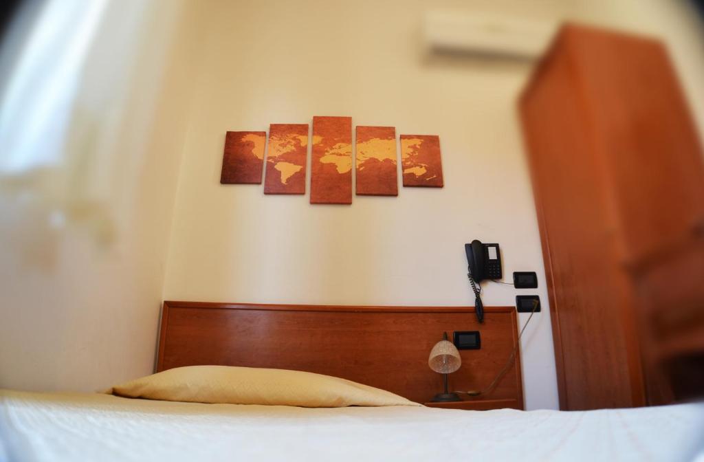 Postel nebo postele na pokoji v ubytování B&B Centrale Affittacamere