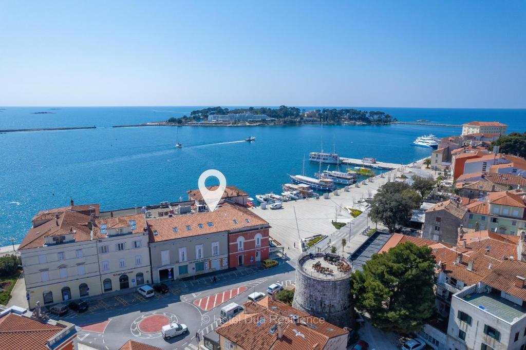 an aerial view of a town next to the water at Hotel Dua Residence in Poreč