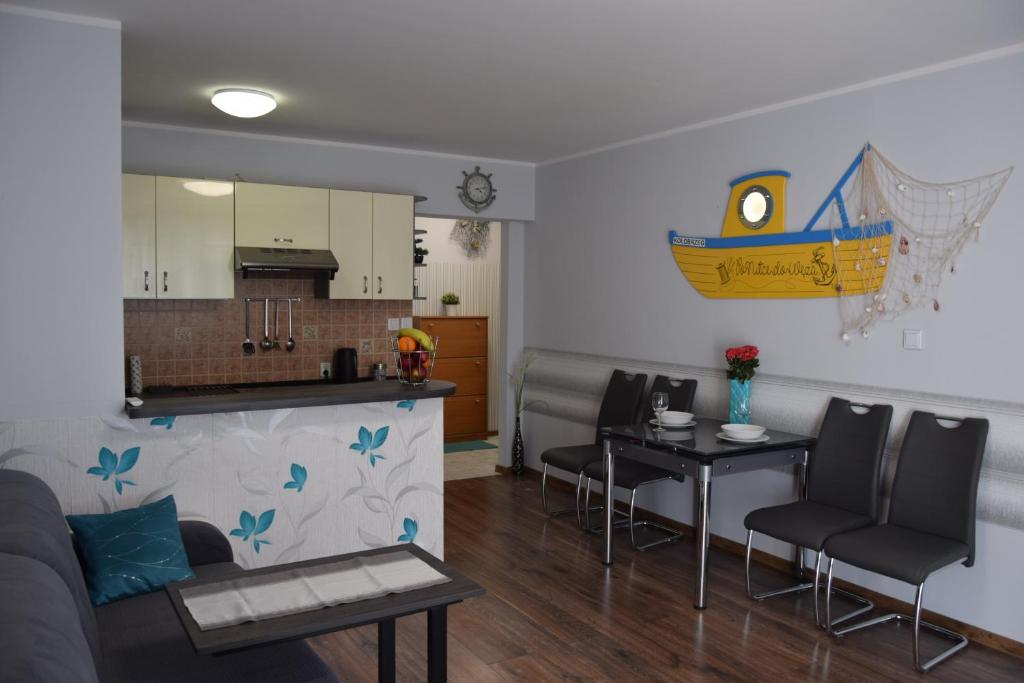 Kuchyň nebo kuchyňský kout v ubytování Apartament Ponitce do Węża - Kołobrzeg