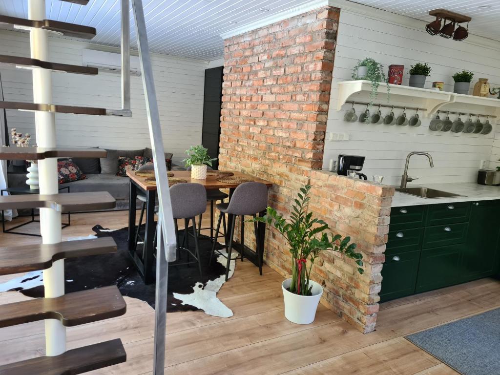 Kuchyň nebo kuchyňský kout v ubytování Pinebo Palace Guesthouse