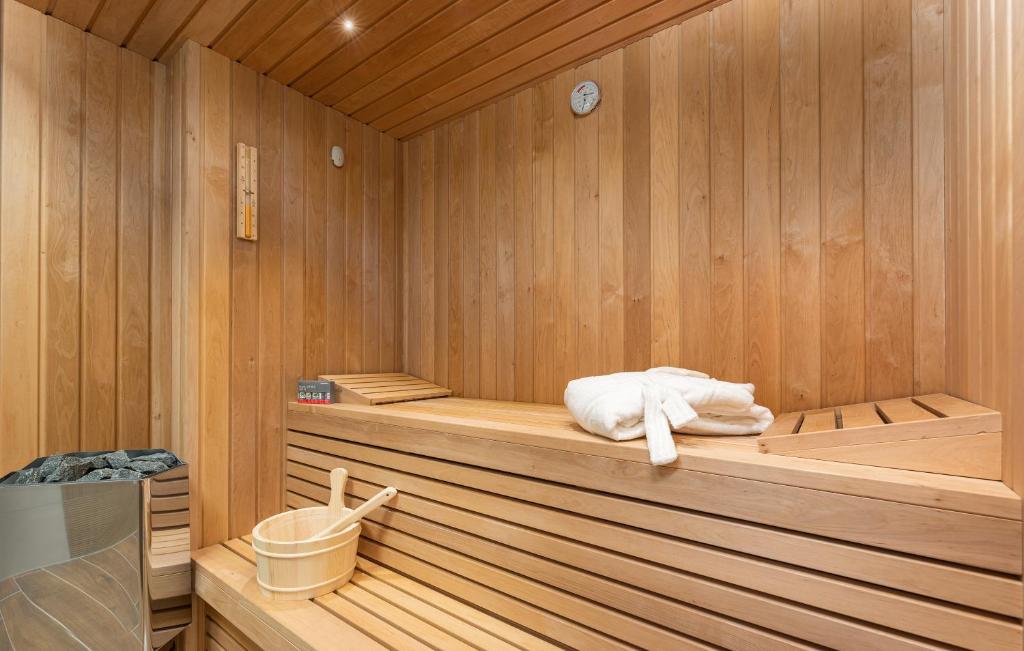 a sauna with a towel laying on thevisor of it at Hotel Dua Residence in Poreč