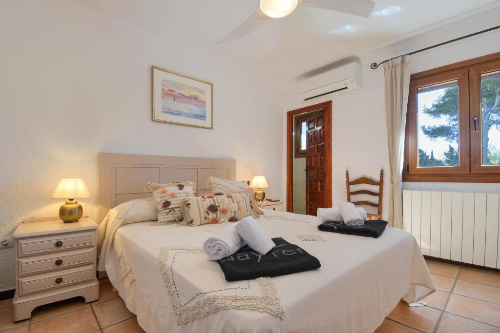 A bed or beds in a room at Las Macadas