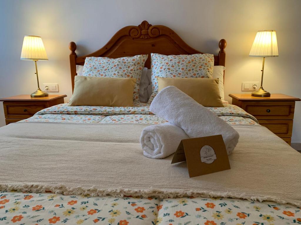 Ένα ή περισσότερα κρεβάτια σε δωμάτιο στο Vivienda vacacional Las Cañas