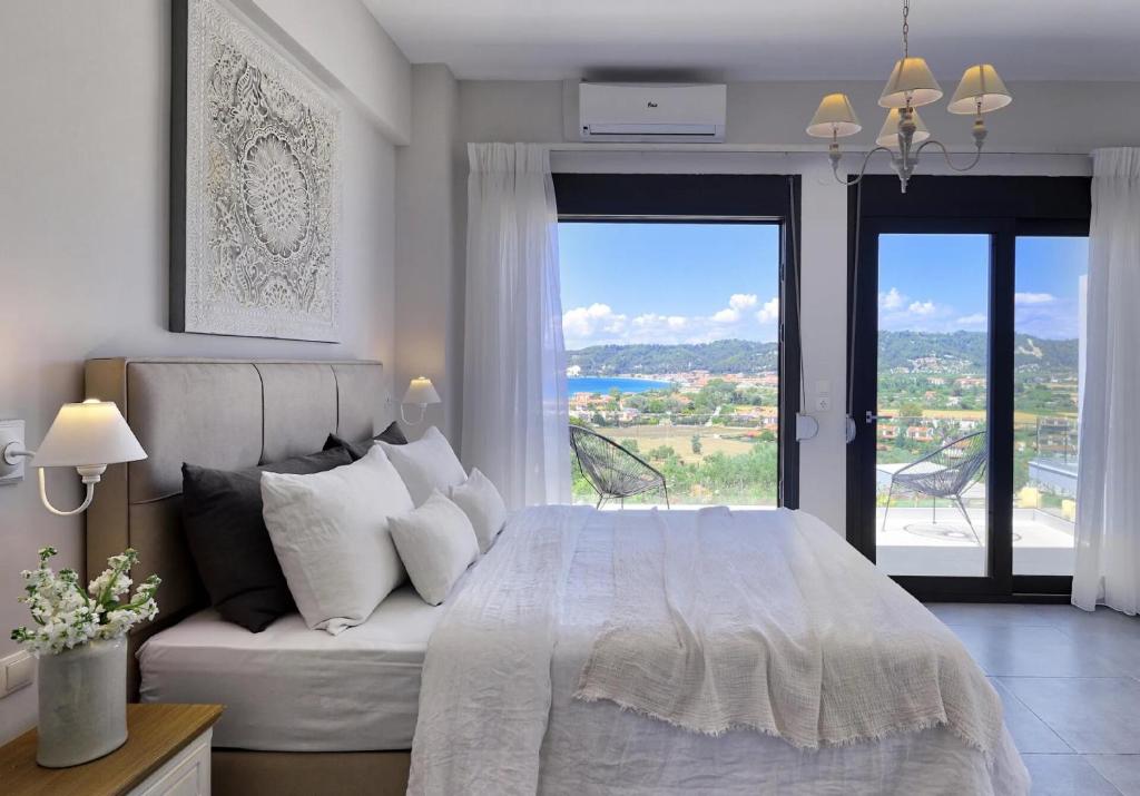 Postel nebo postele na pokoji v ubytování Soleado Luxury Villas