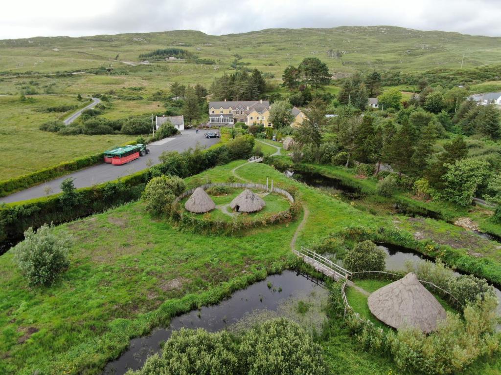 an aerial view of a farm with hay roofs at Dan O'Hara Farmhouse B&B in Clifden