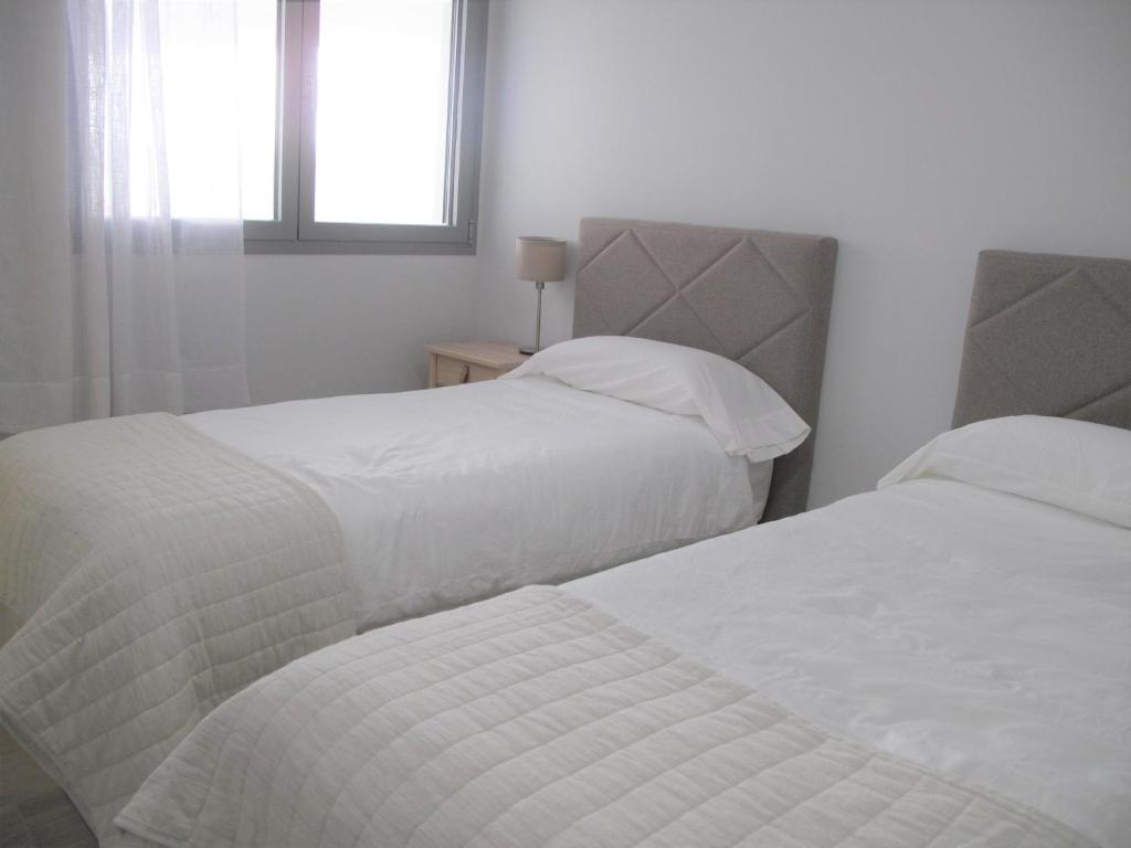 Posteľ alebo postele v izbe v ubytovaní Holiday apartment Inbisa