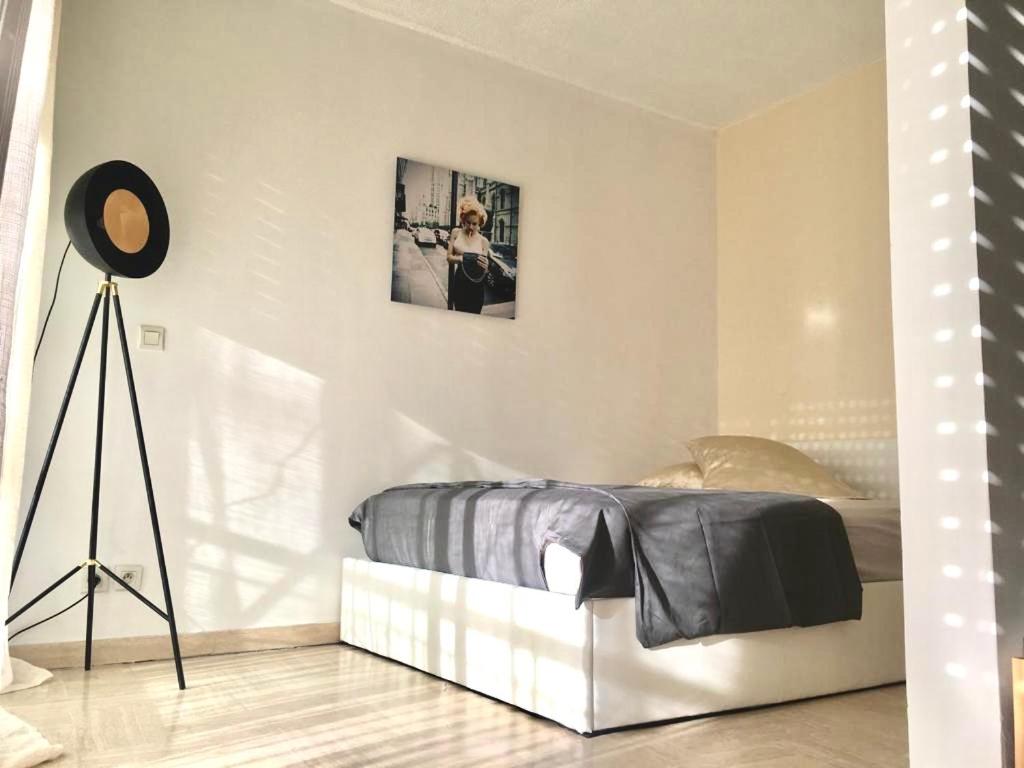 Cama ou camas em um quarto em Lovely Appartment Cannes Marina