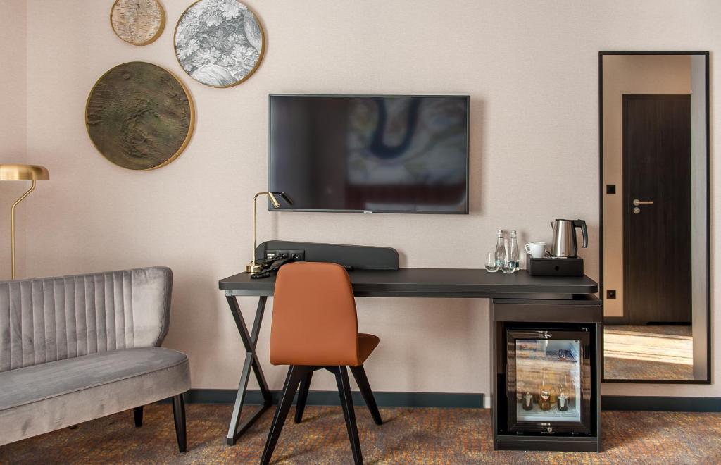 TV a/nebo společenská místnost v ubytování Mercure Bialystok