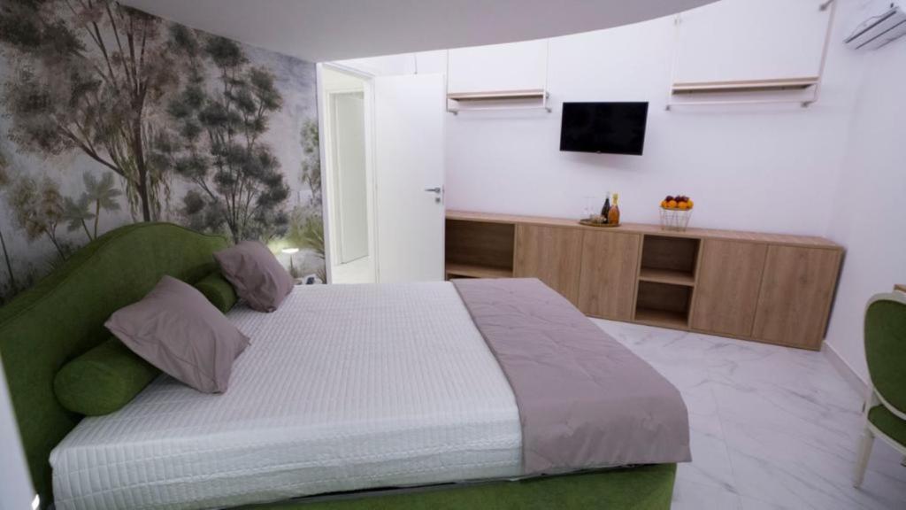 Posteľ alebo postele v izbe v ubytovaní Albanèse Luxury Rooms