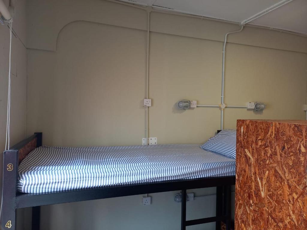 Postel nebo postele na pokoji v ubytování Lima.Tujoh