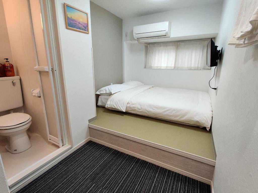 Postel nebo postele na pokoji v ubytování da inn