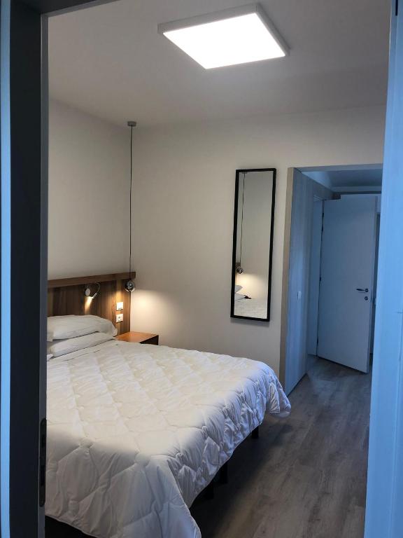 Postel nebo postele na pokoji v ubytování Hotel Oliva