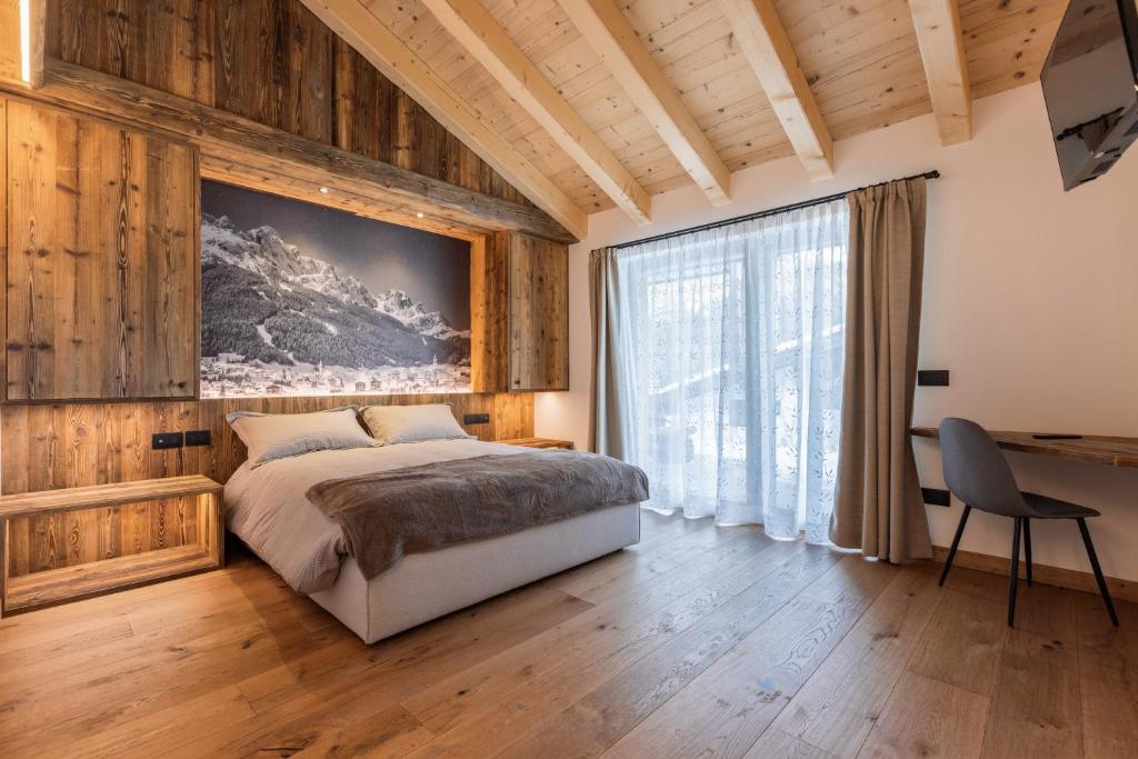 Postel nebo postele na pokoji v ubytování B&B Al Mulin