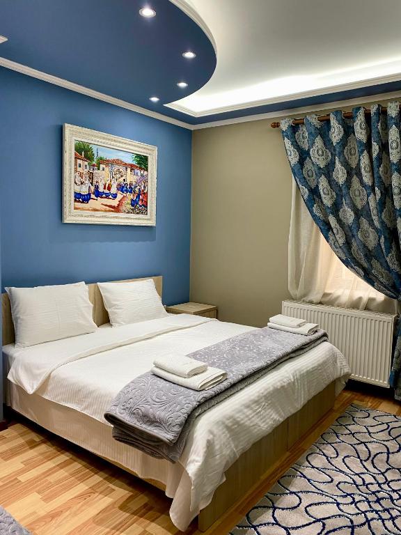 Postel nebo postele na pokoji v ubytování Vila A Hotel