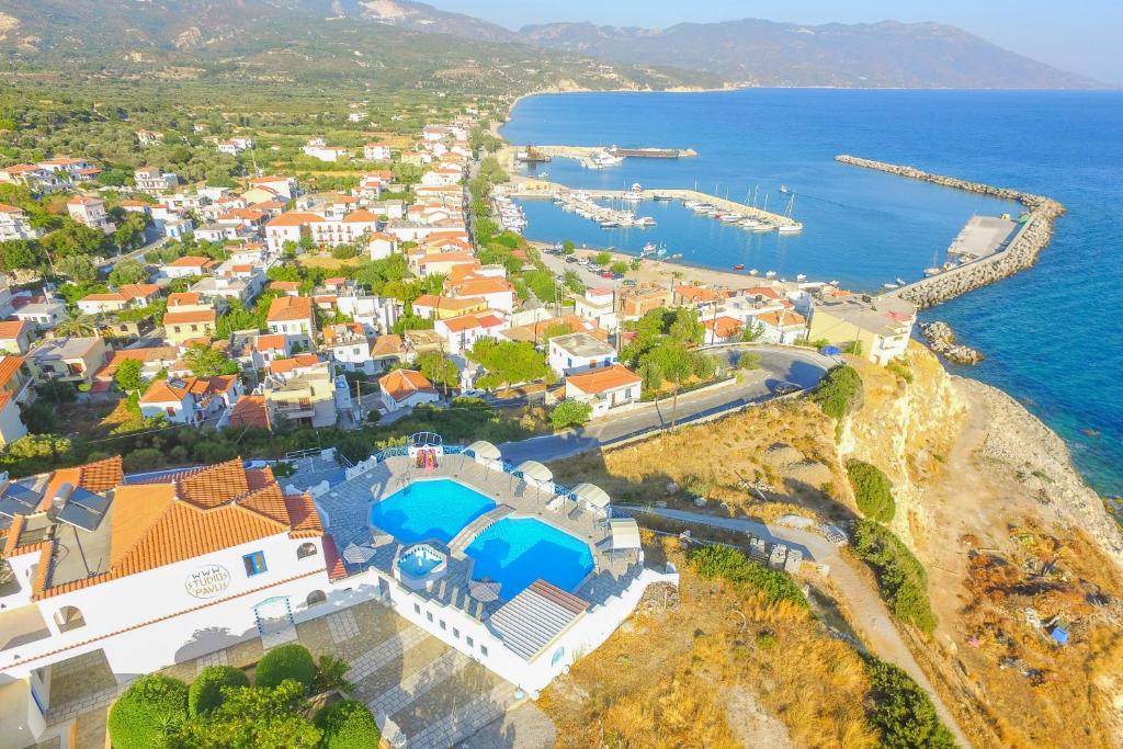 an aerial view of a small town on the coast at Pavlis Studios in Marathokampos