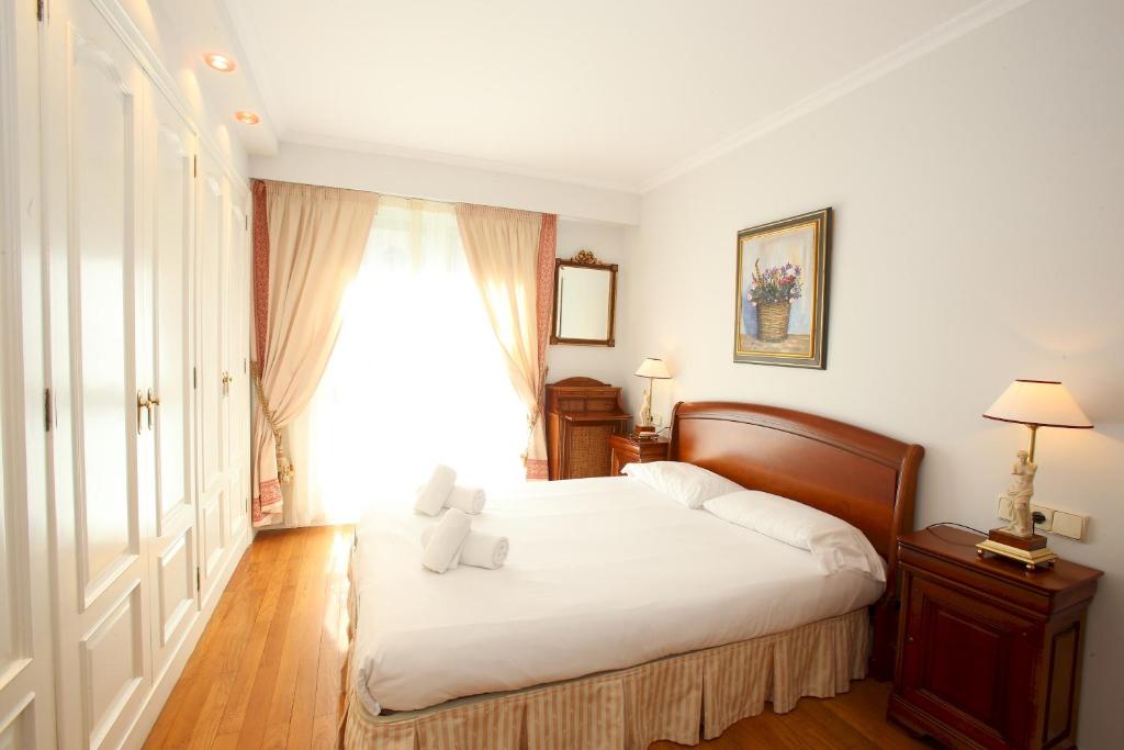 Posteľ alebo postele v izbe v ubytovaní Apartamento Ondarreta