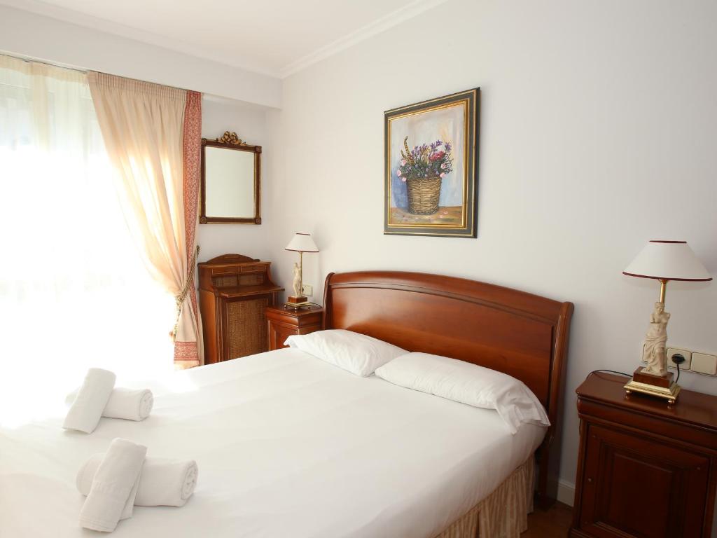 Posteľ alebo postele v izbe v ubytovaní Apartamento Ondarreta