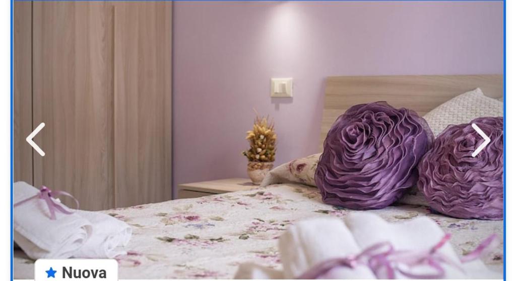 A bed or beds in a room at Appartamento francy