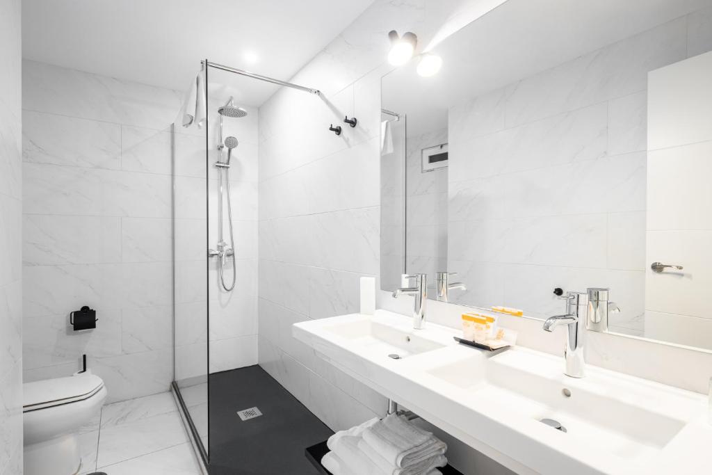 Koupelna v ubytování Hotel Cortezo