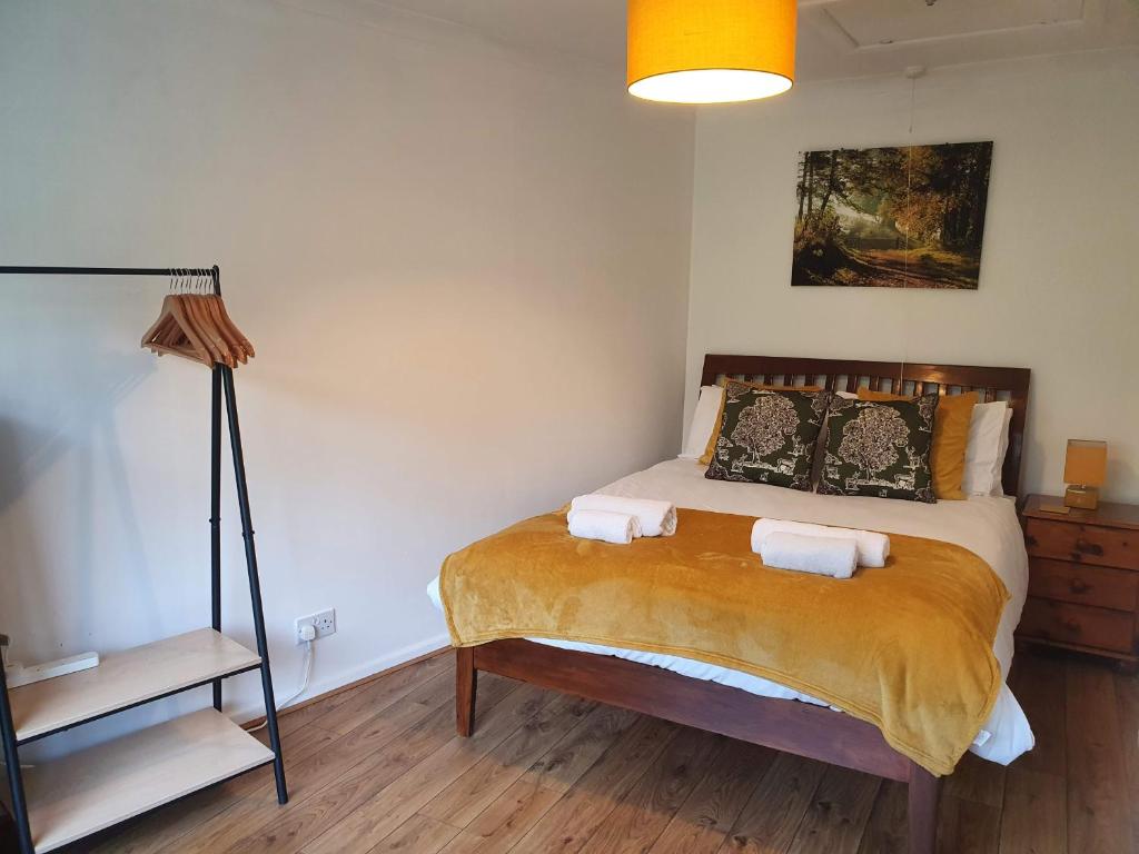 Ліжко або ліжка в номері Stockwood House by Cliftonvalley Apartments