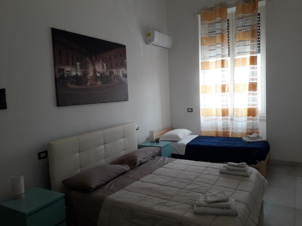 Postel nebo postele na pokoji v ubytování Gymnasium