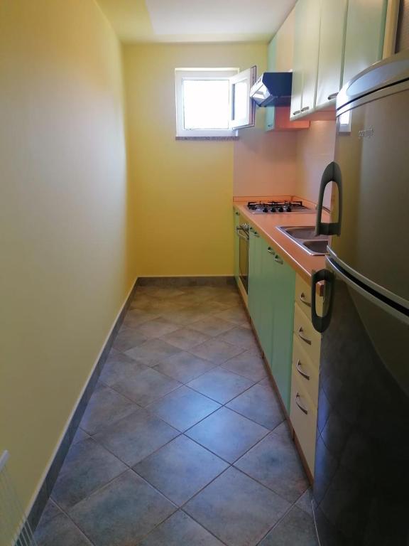 Kuchyň nebo kuchyňský kout v ubytování Robinson's house