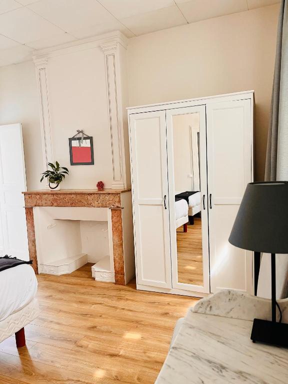 Postel nebo postele na pokoji v ubytování Hôtel Restaurant La Désirade