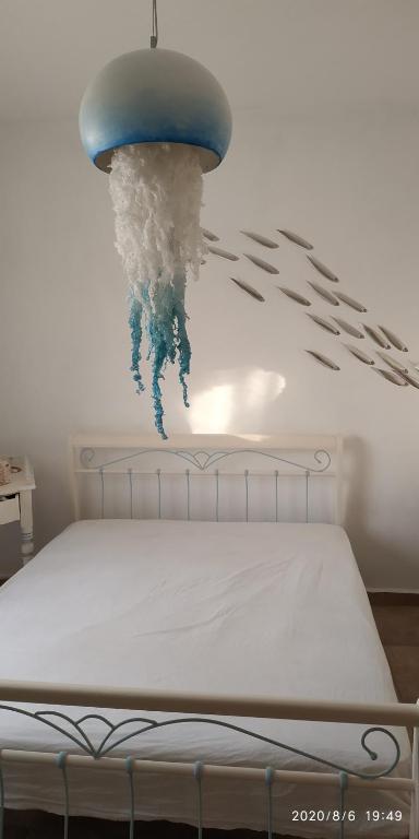 Postel nebo postele na pokoji v ubytování Sea Art House