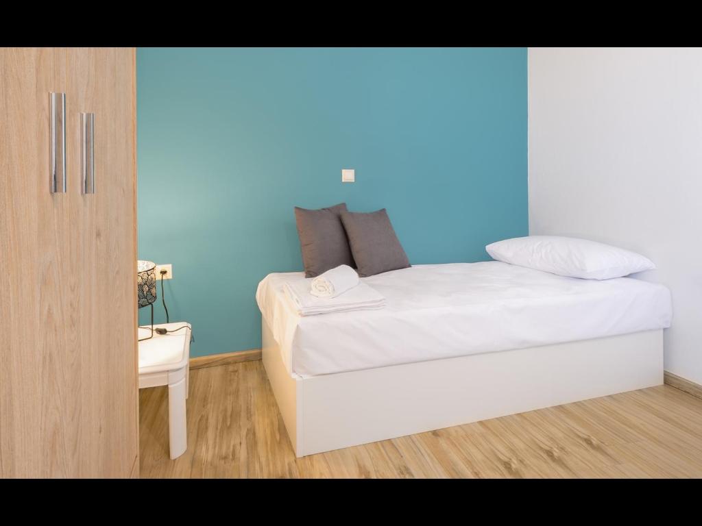 Łóżko lub łóżka w pokoju w obiekcie Thassian Riviera Hotel